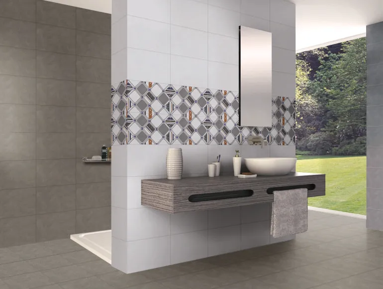 Sophisticated grey bathroom design with a sleek sink, window, and shower area